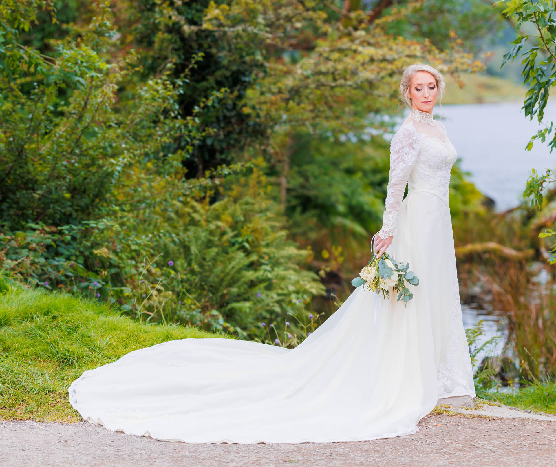 Bride and groom sharing an intimate moment at Gougane Barra, Cork, JOD'Photography