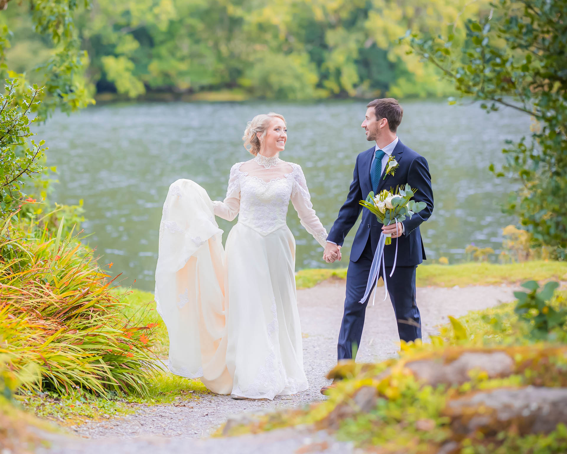Bride and groom sharing an intimate moment at Gougane Barra, Cork, JOD'Photography