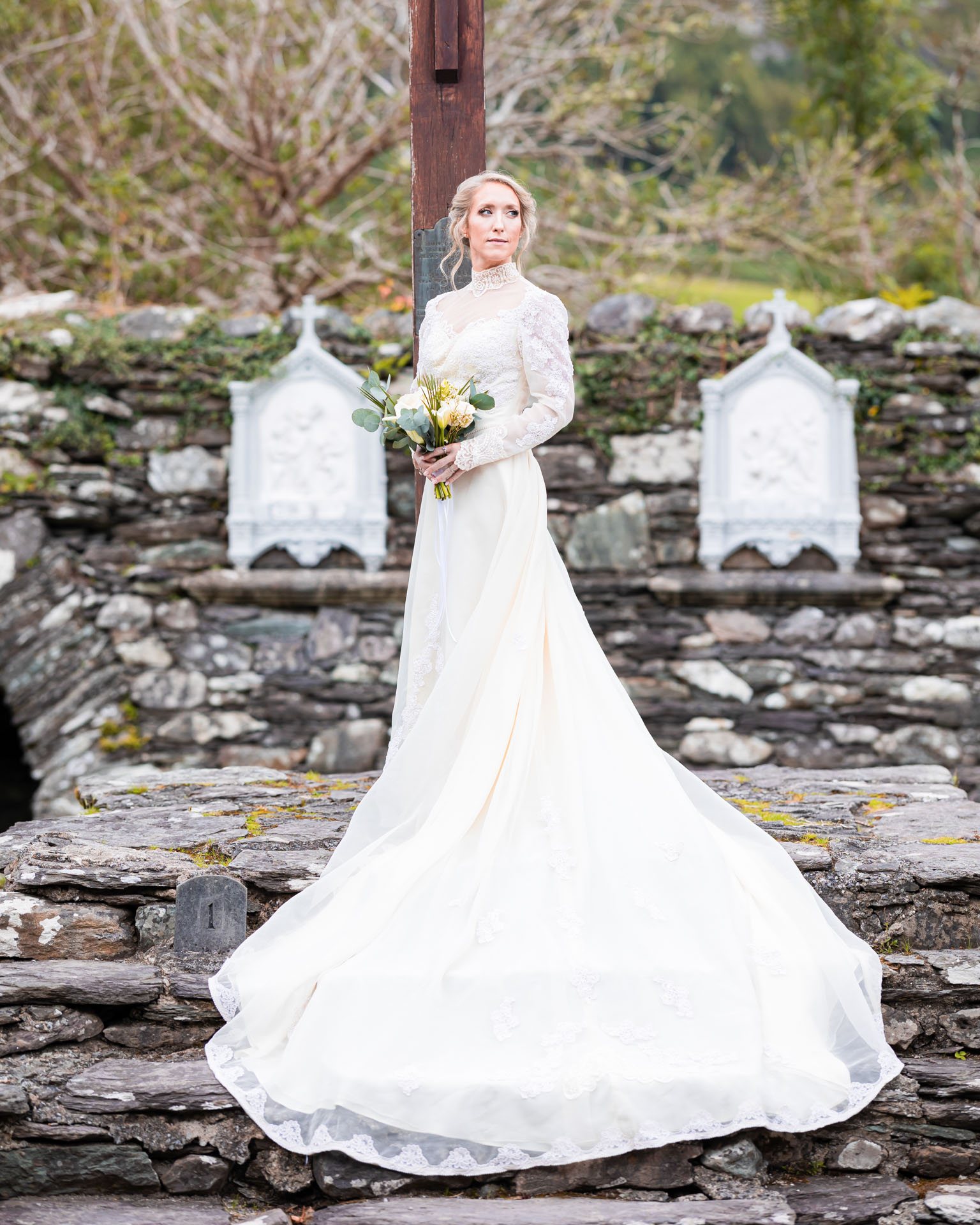 Bride and groom standing together under the trees at Ballyseedy Castle, Kerry, JOD'Photography