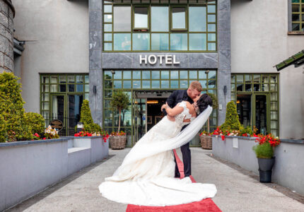 Dip kiss the groom dips his new wife outside the Oriel House Hotel Cork-JOD'Photography