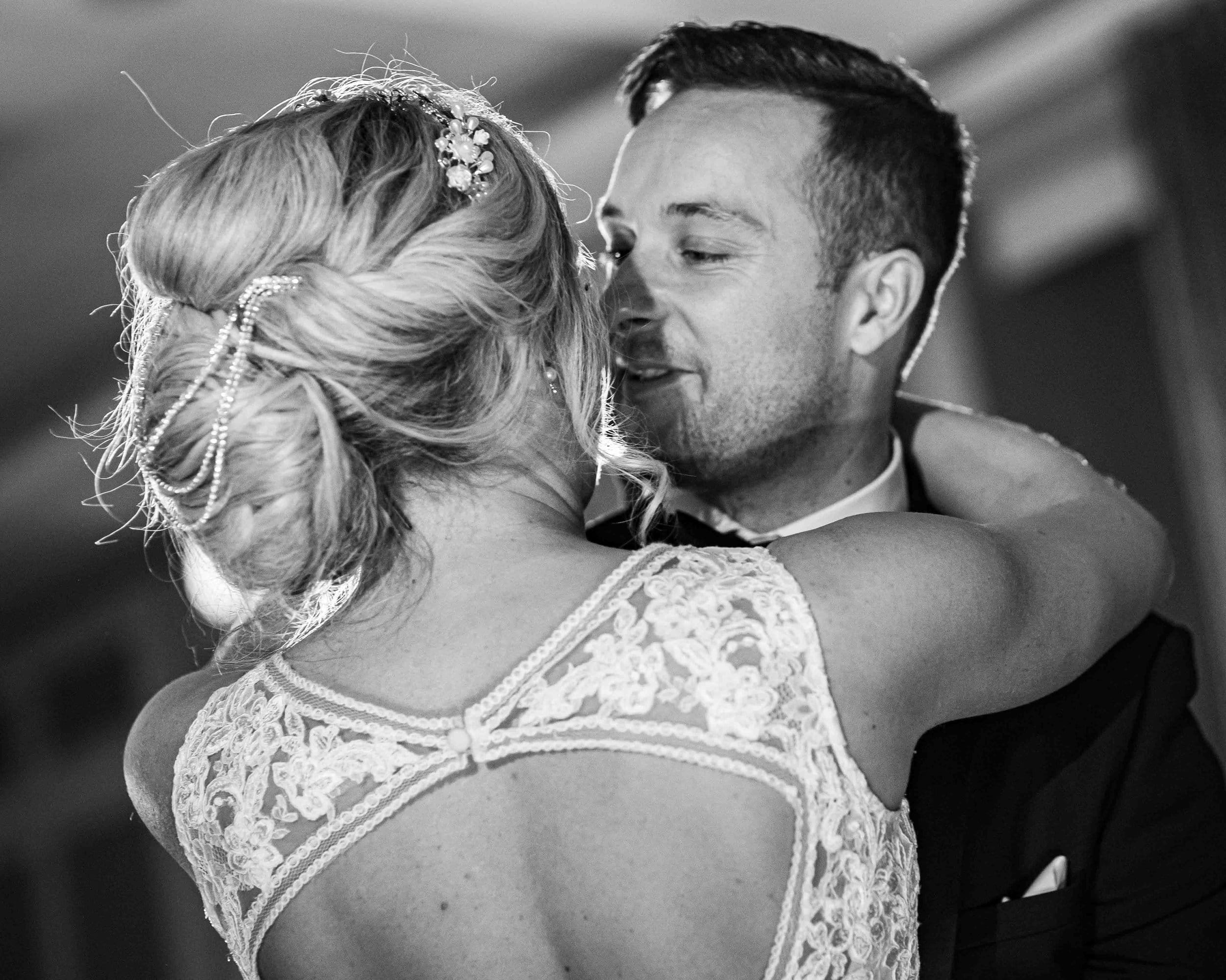 First dance, groom gazes into the eyes of his wife as they dance to their first song at the Great Southern Hotel Killarney