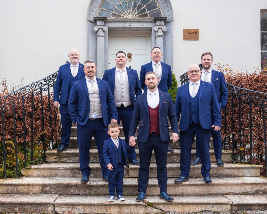 Groom adjusting tie at Radisson Blu Hotel & Spa, Cork – JOD Photography