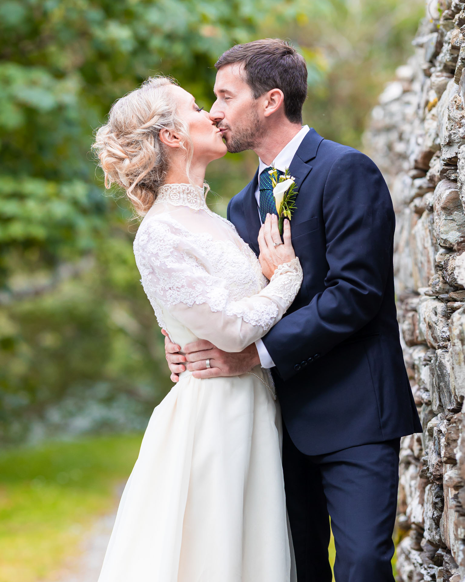 Groom and bride walking hand-in-hand at Ballyseedy Castle, Kerry, JOD'Photography