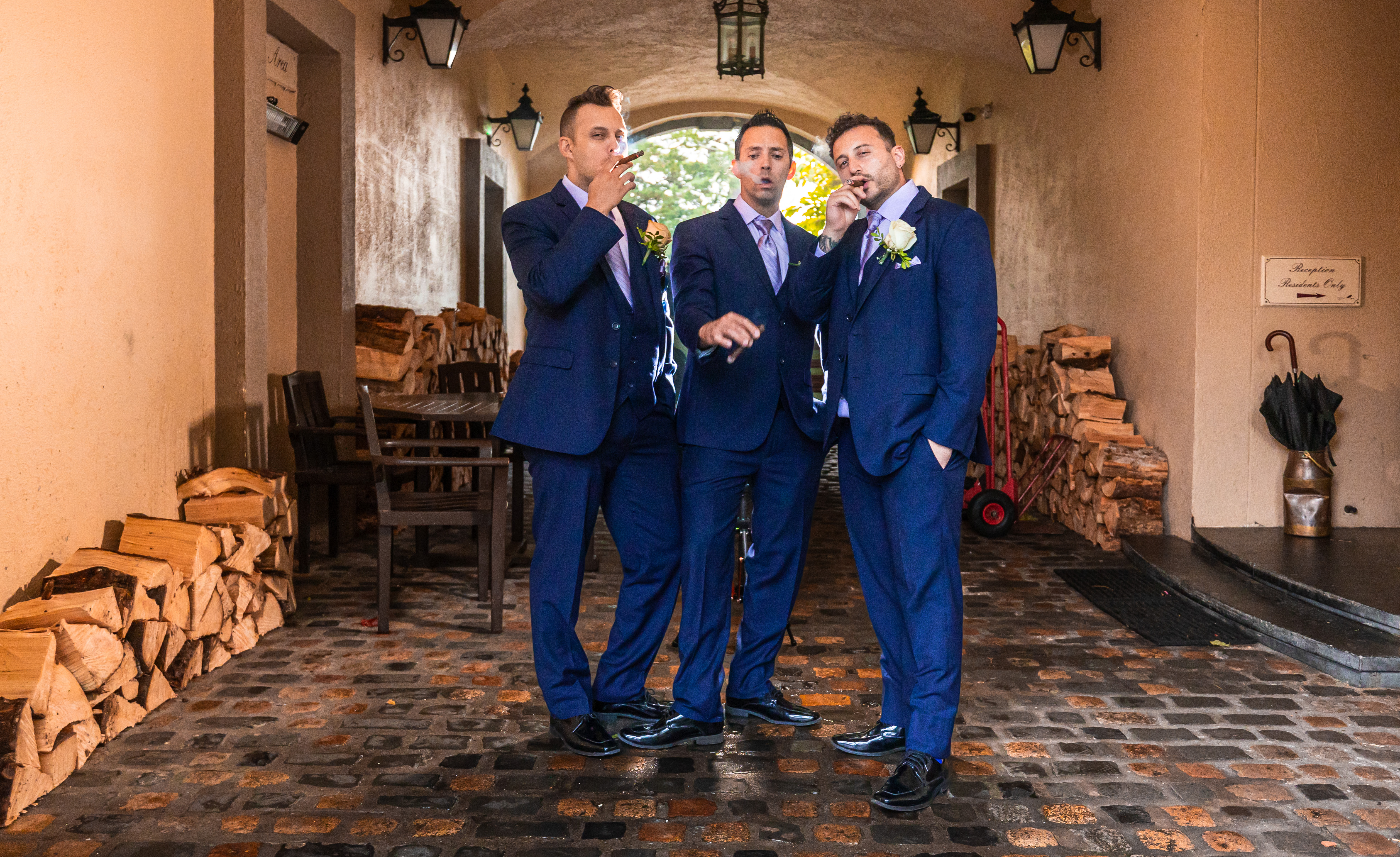 Groom & Groomsmen smoking cigars at a wedding venue in Kerry-JOD'Photography