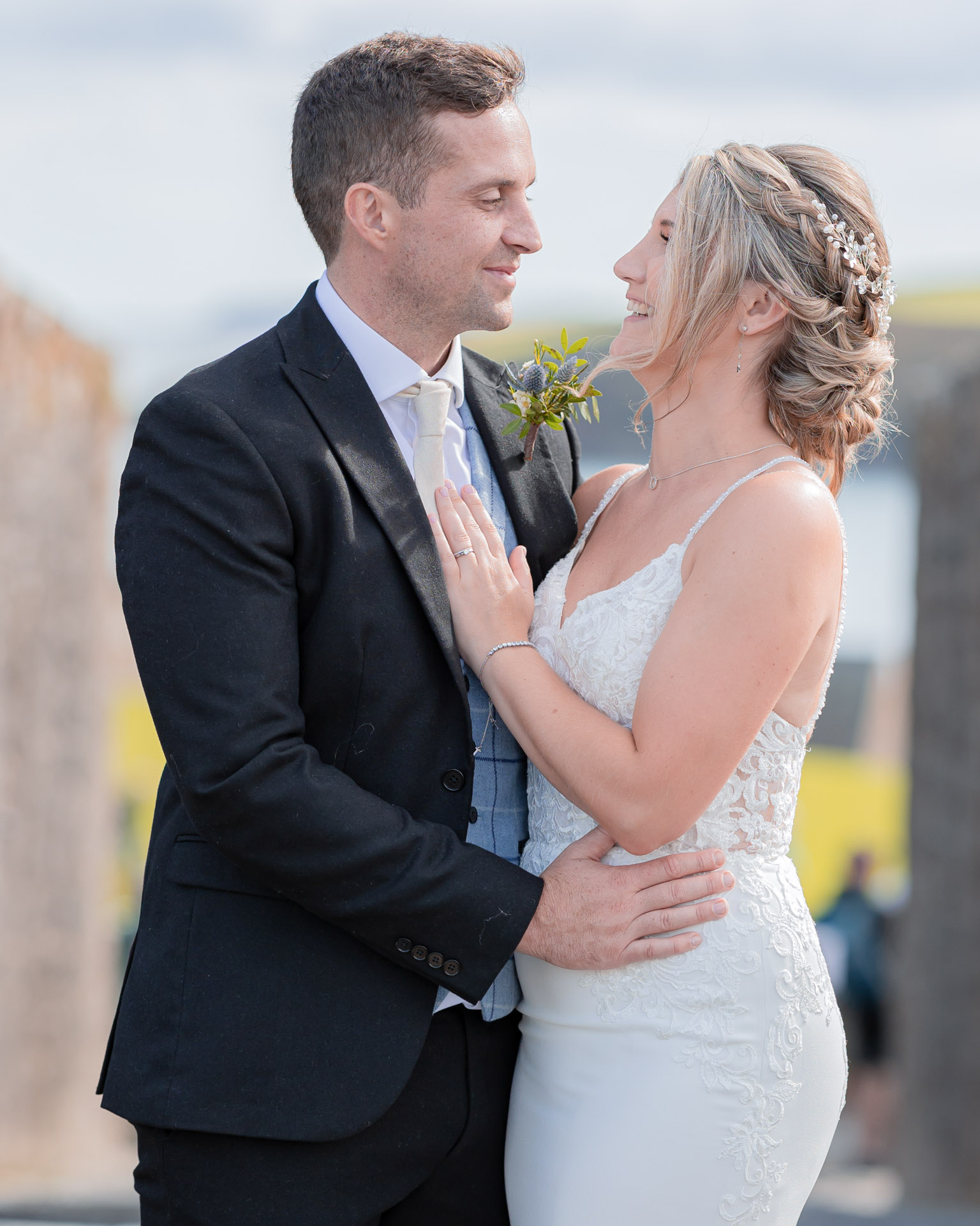 Groom kissing his bride under the dramatic sky of Tralee, Kerry, JOD'Photography
