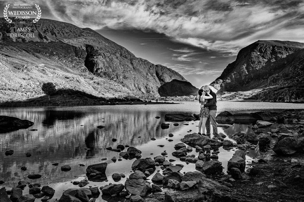 Newly engaged couple holding one another at the Gap Of Dunloe Kerry