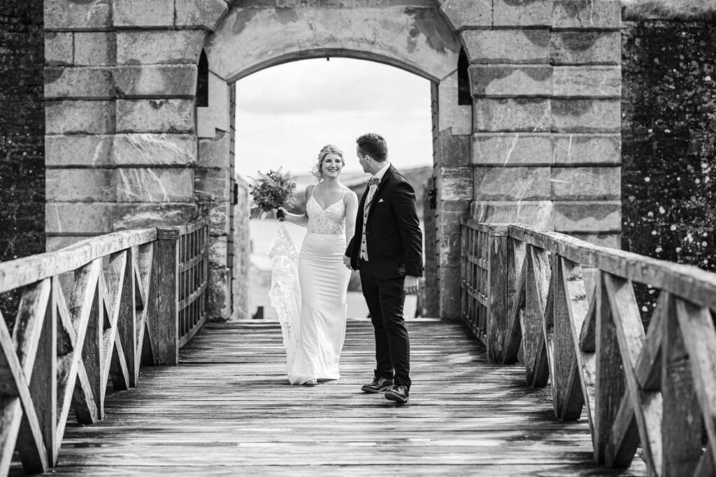 Newlyweds exchanging vows in a beautiful summer wedding at Kinsale Hotel, Cork – JOD Photography