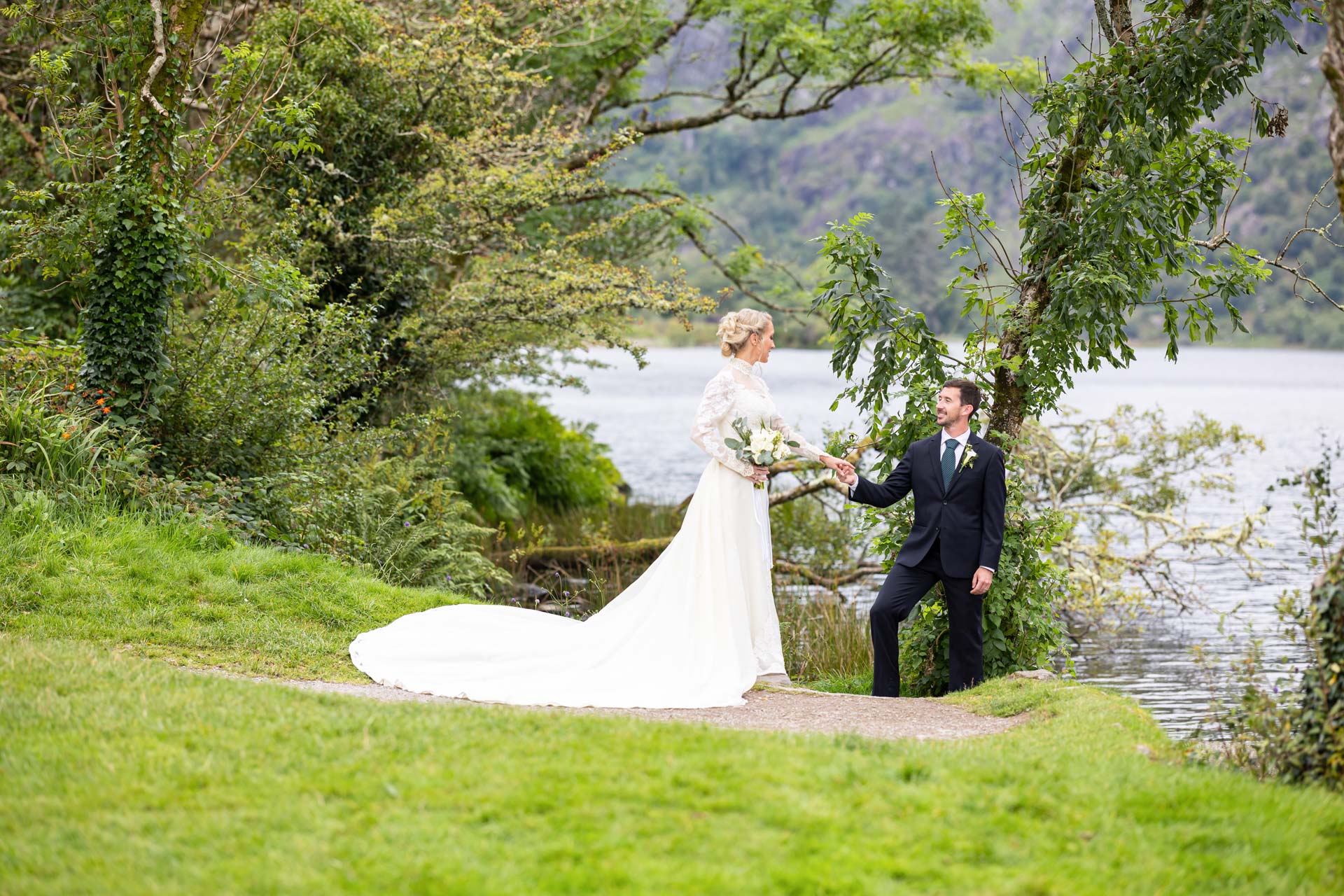 Bride and groom sharing an intimate moment at Gougane Barra, Cork, JOD'Photography