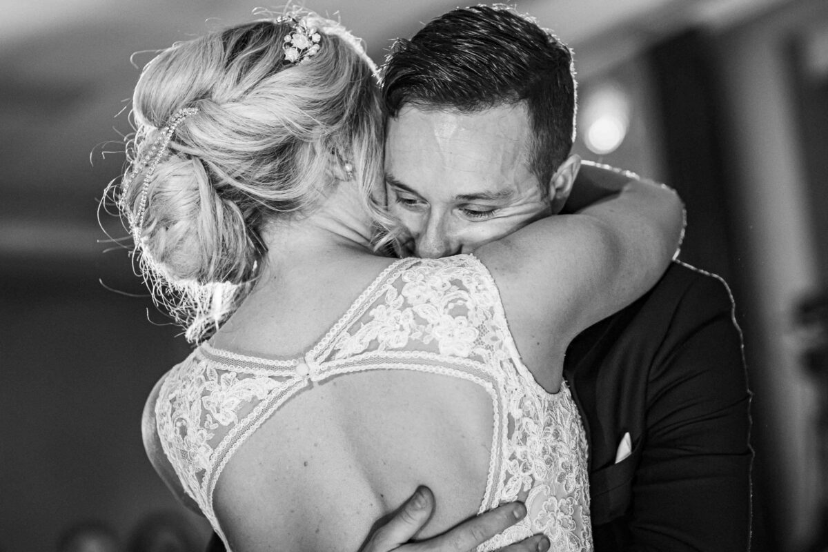 First dance, groom gazes into the eyes of his wife as they dance to their first song at the Great Southern Hotel Killarney