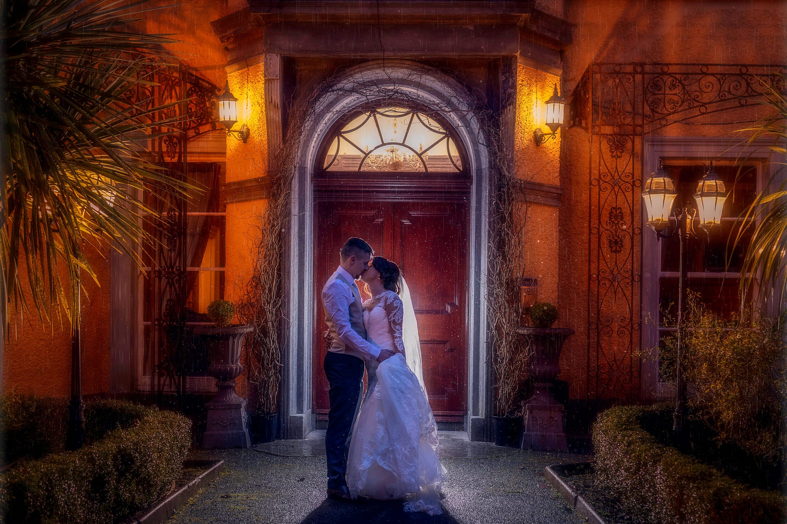 romantic night time portrait of bride and groom outside Vienna woods hotel cork