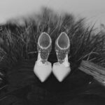 Wedding shoes on a rock in west cork as the dramatic Irish weather closes in around them-JOD'Photography