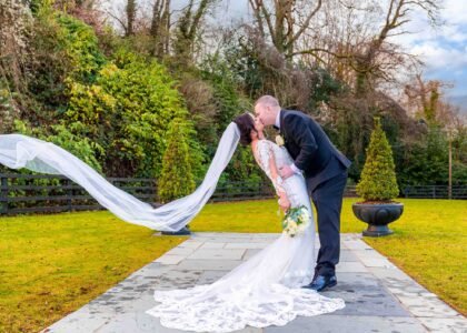 Dip kissing is my bride and groom at Vienna Woods Hotel Cork