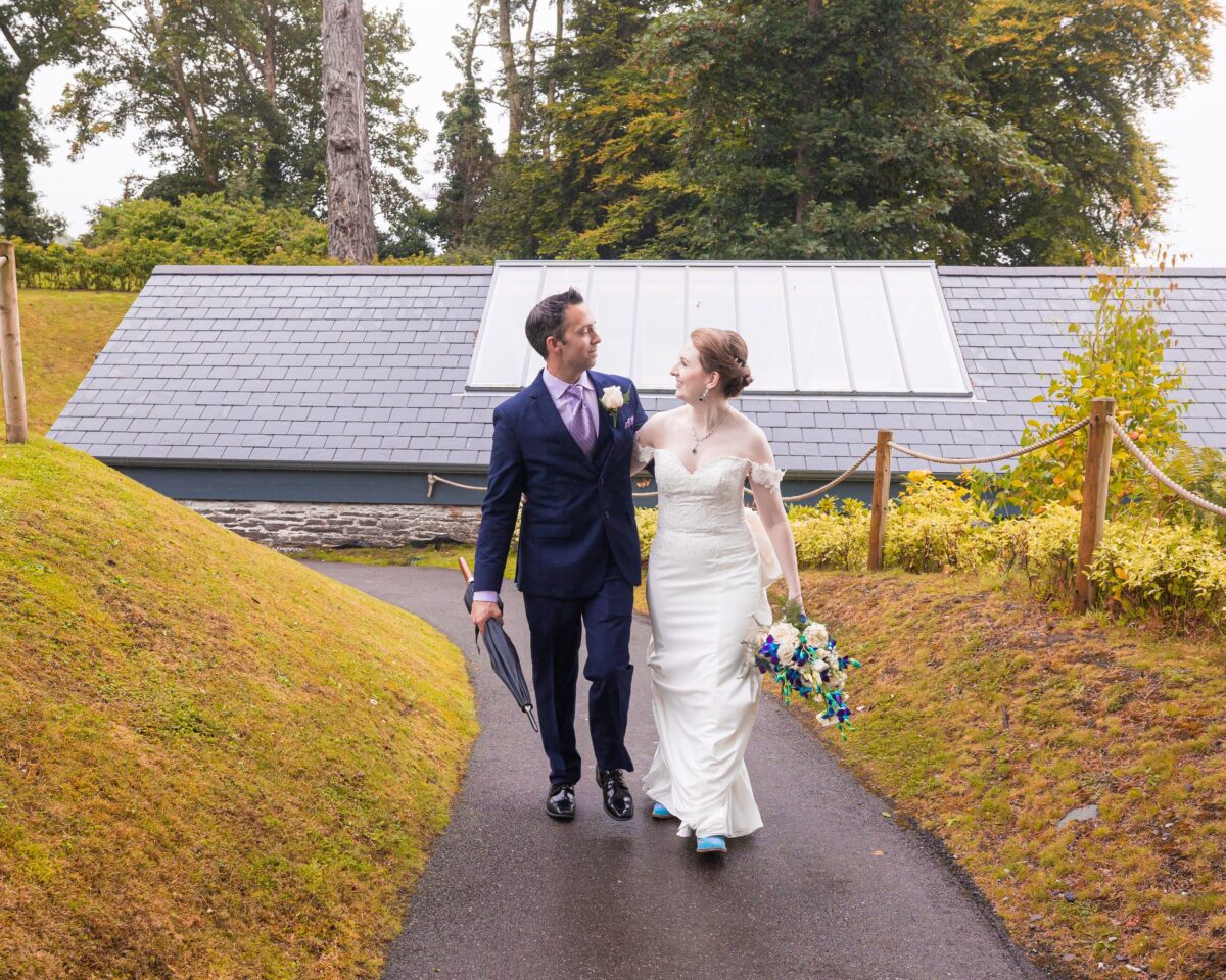 Bride laughing with bridesmaids before walking down the aisle – JOD Photography