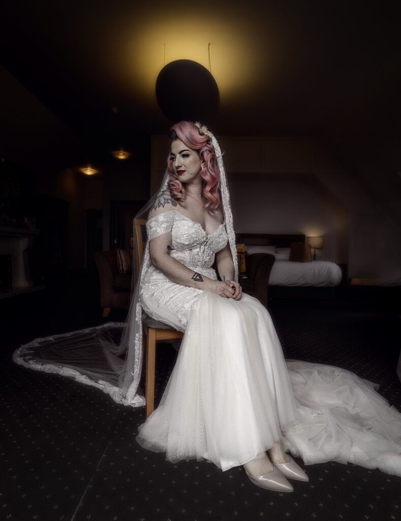 Newlyweds sharing a kiss on the beach at Garryvoe Hotel, Cork – JOD Photography