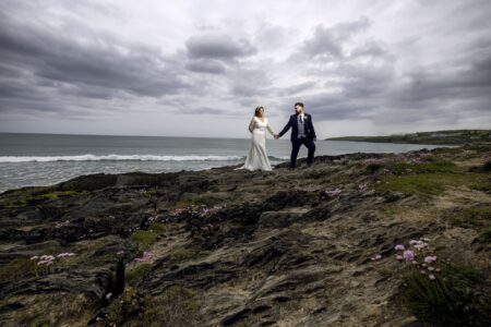 Romantic couple embracing by Gougane Barra lake, captured by Ireland vacation photographer JOD Photography