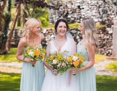Innishannon’s colorful gardens burst with life, complementing a joyful wedding, photographed by JOD'Photography.