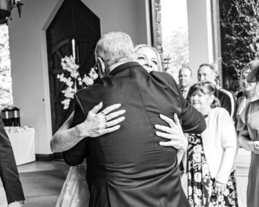 Holly hugging her father after she walked up the aisle at Mucross Hotel and spa Killarney - JOD'Photography