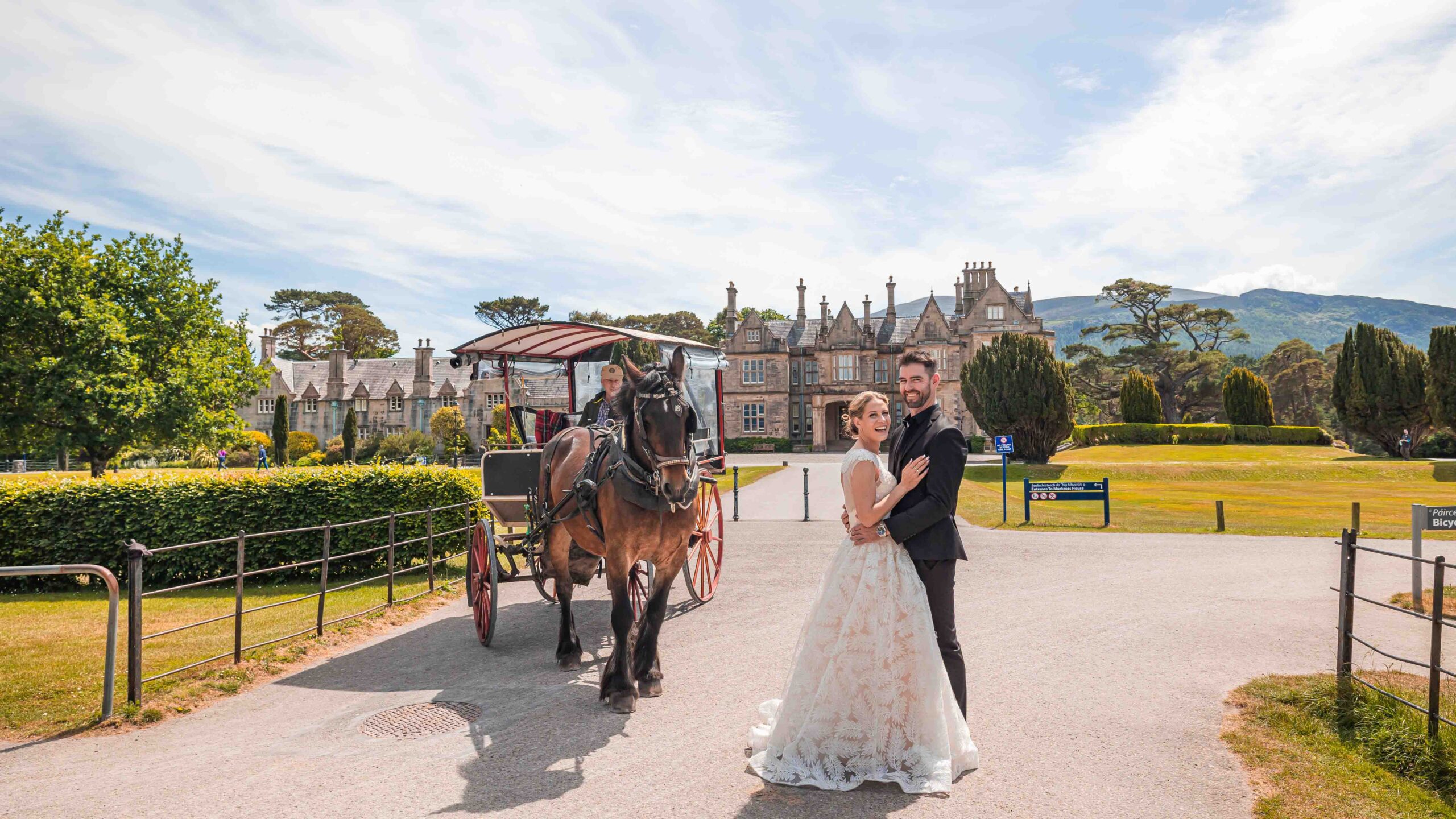 Bride and groom laughing in the Jaunty cart ride JODPhotography
