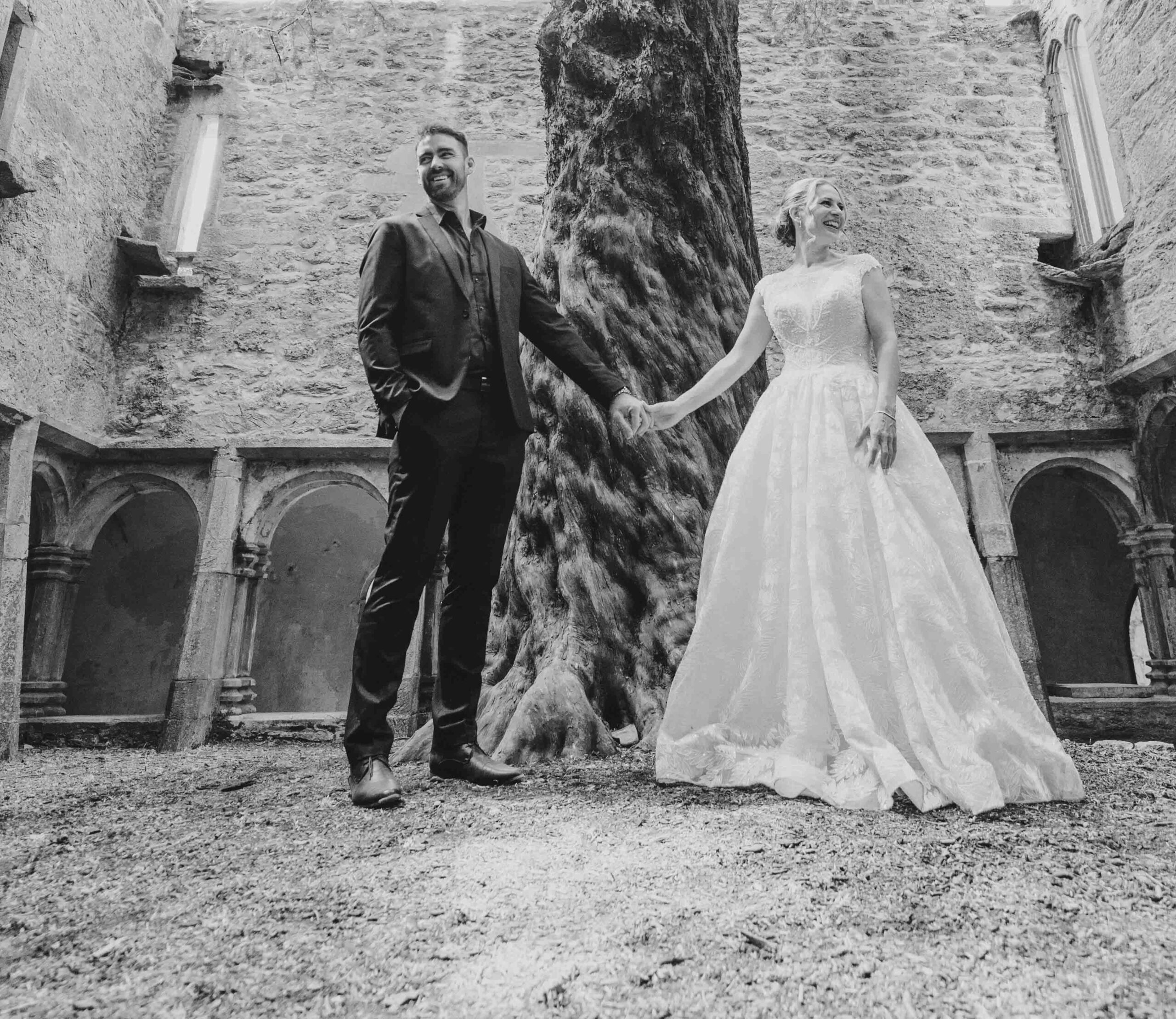 A silhouette kiss near the Abbey pillars JODPhotography