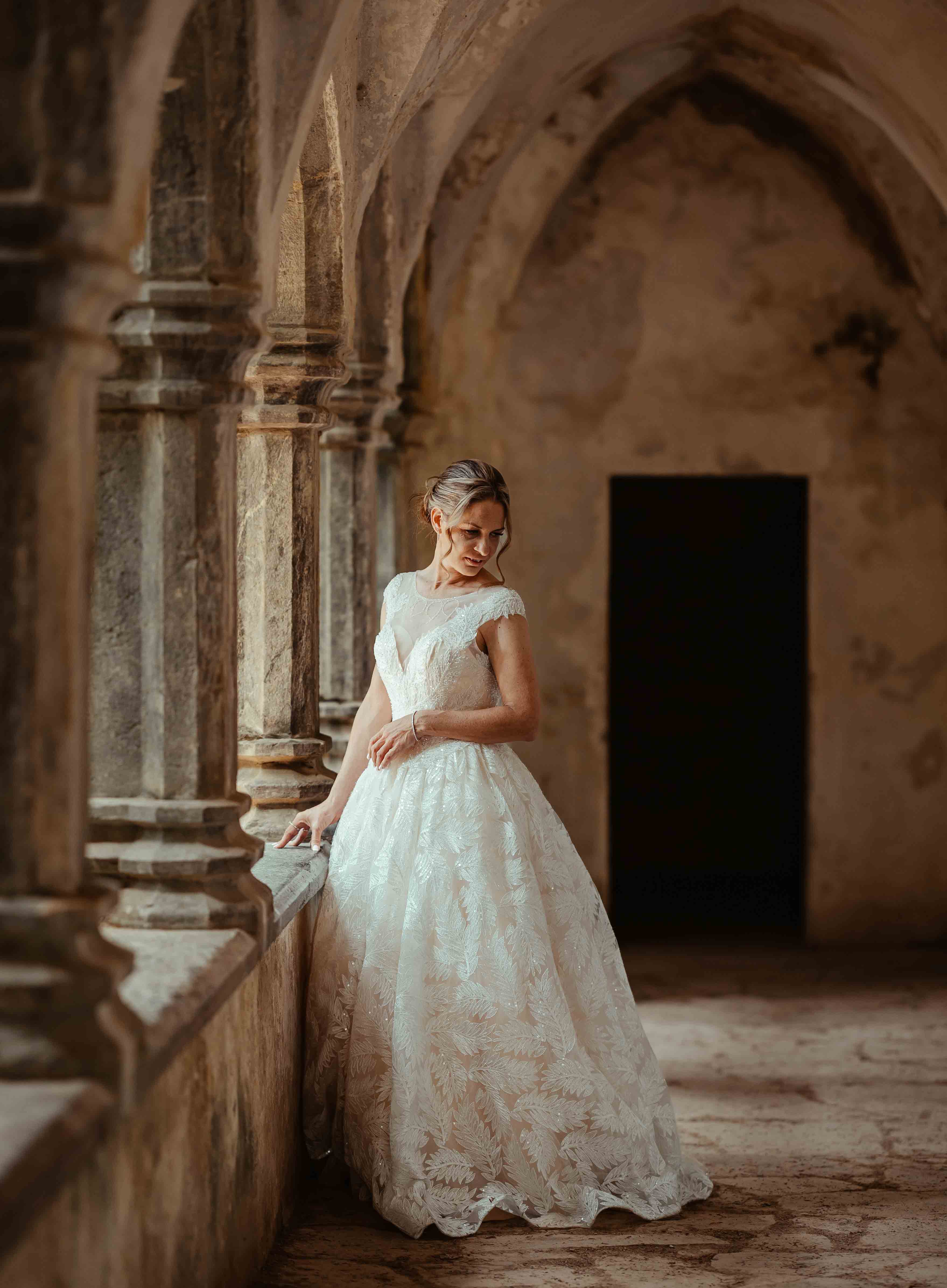 Wide shot of Muckross Abbey with wedding party – JOD'Photography