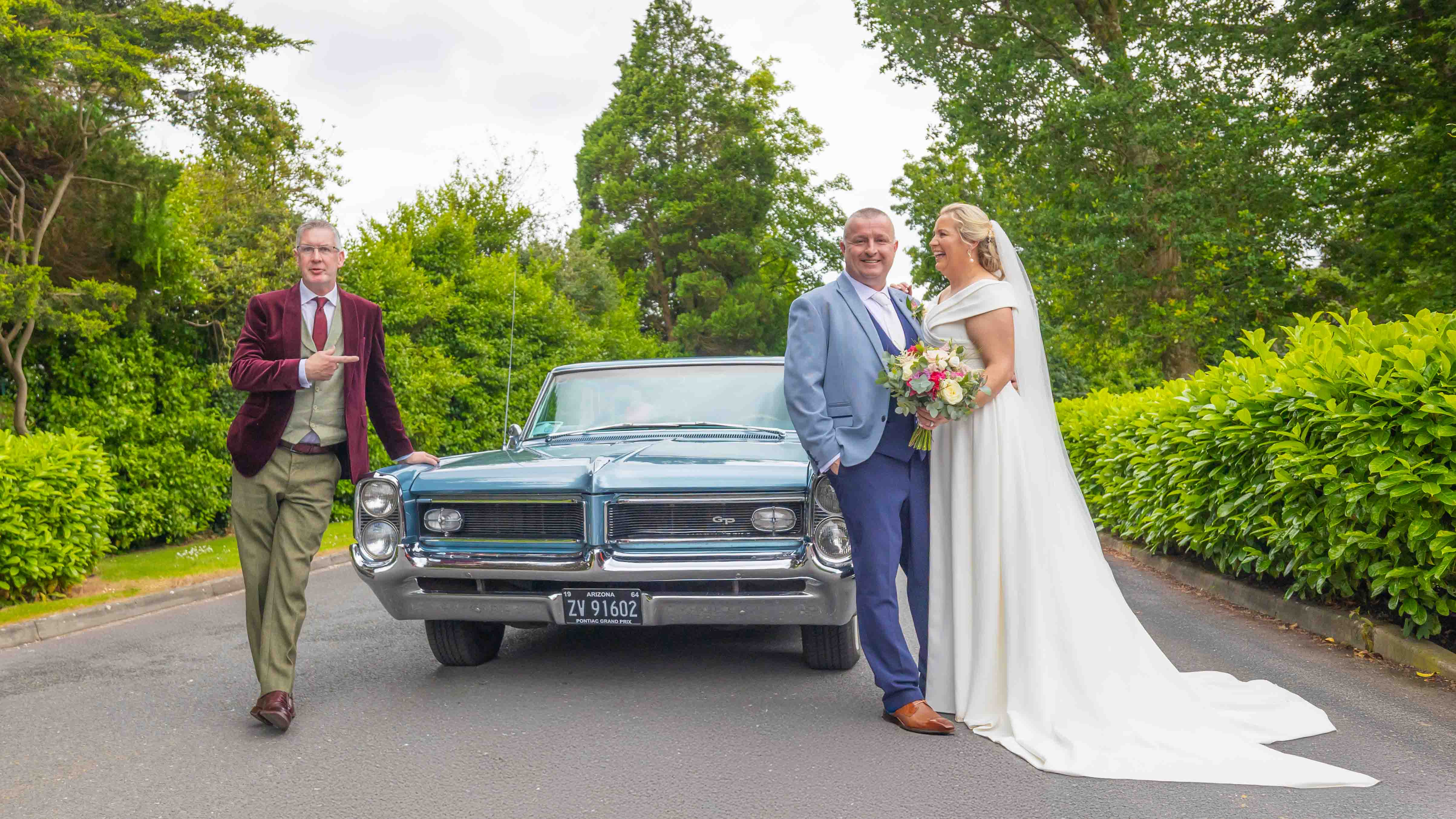 Bride and groom walking the grounds of Rochestown Park Hotel – JOD’Photography