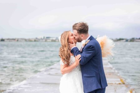 Friends hugging MJ post-ceremony – JOD’Photography