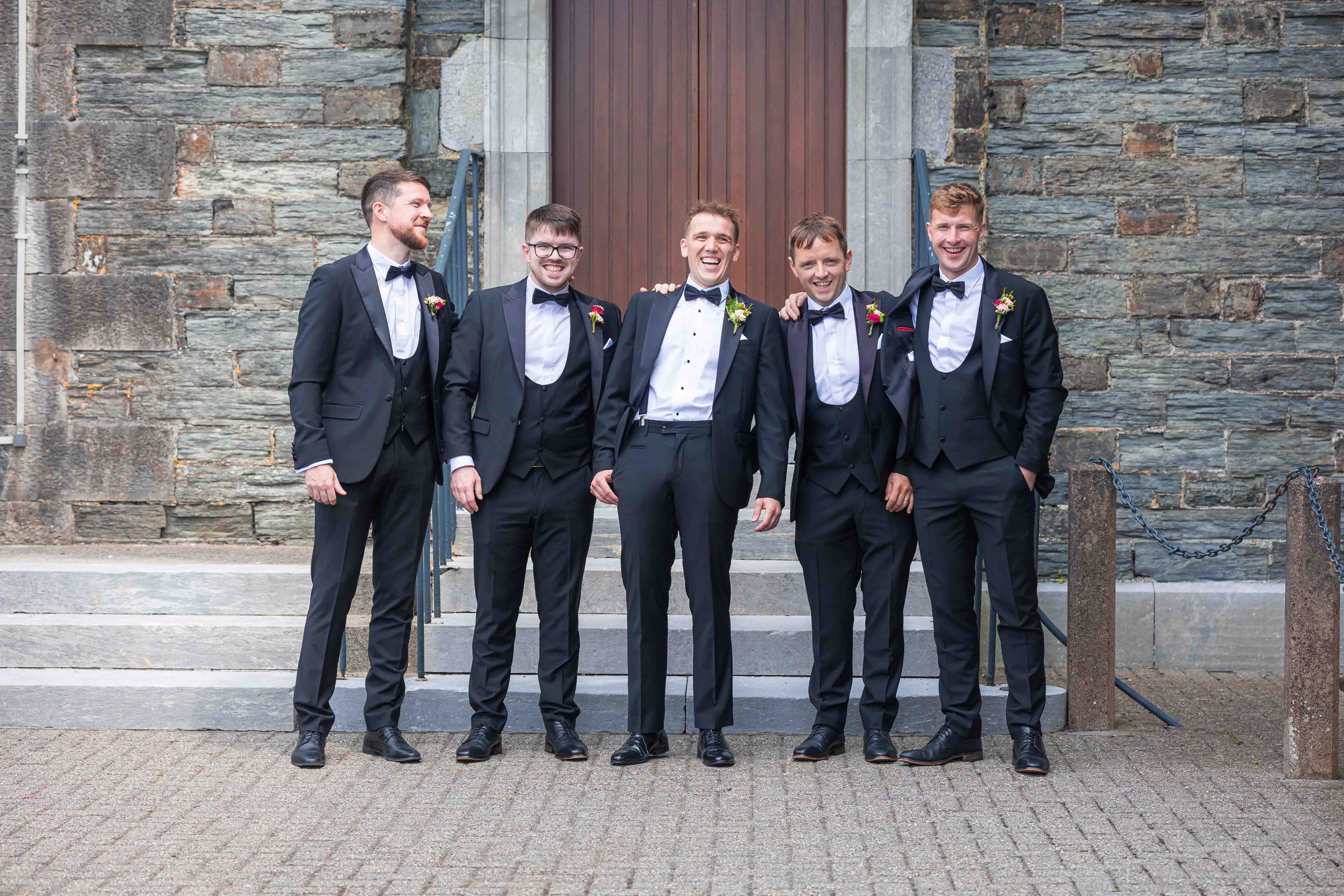 Eva smiling while holding bouquet from Daisy Chain Kinsale – JOD'Photography