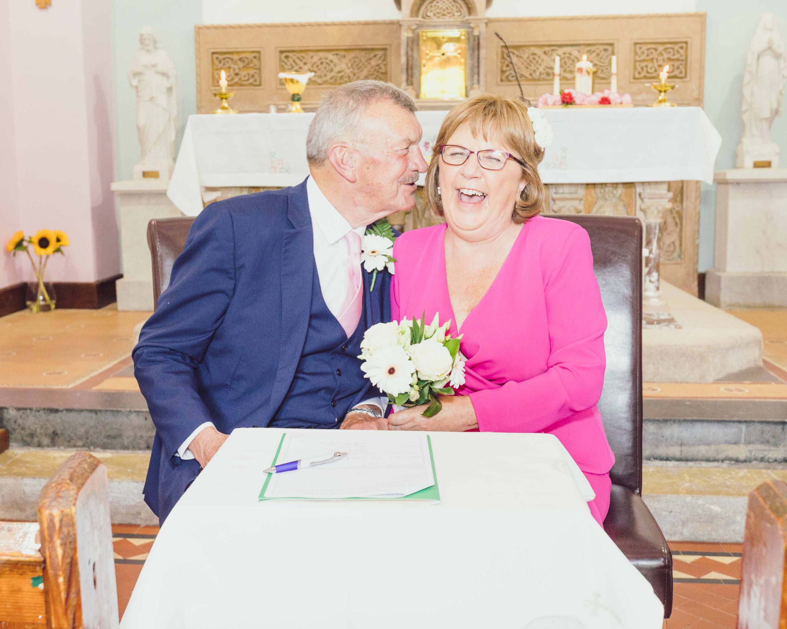 Bride smiling at the groom during the vows at Gougane Barra JODPhotography