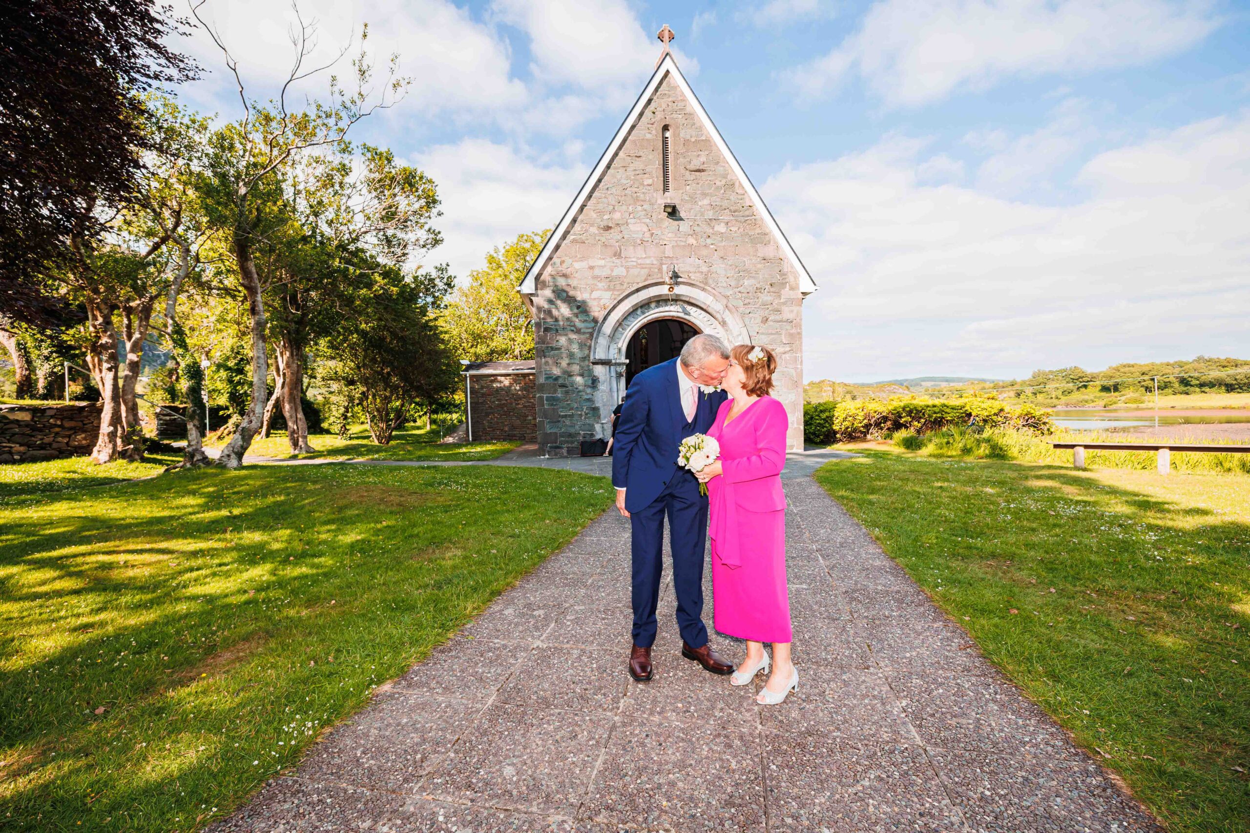 Bride smiling at the groom during the vows at Gougane Barra JODPhotography