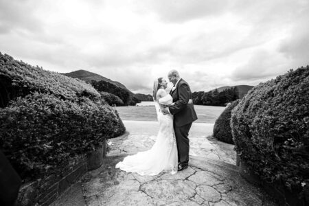 Guests smiling and clapping during the wedding speeches – JOD Photography