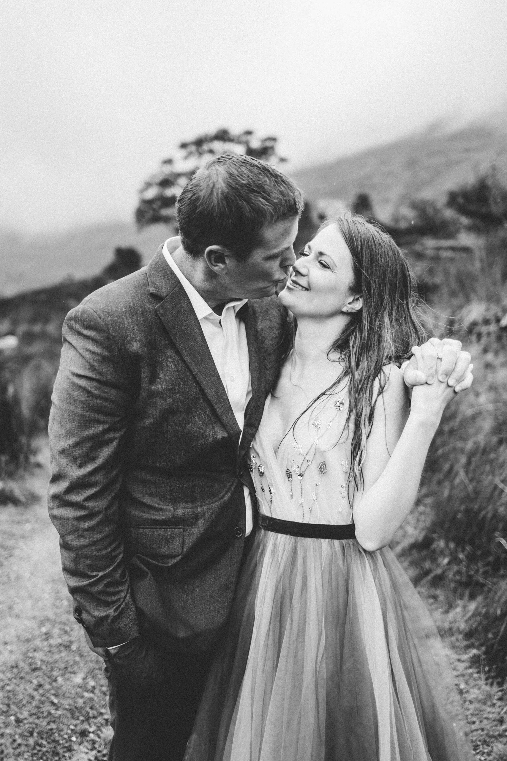 intimate black and white photo of the couple embracing JODPhotography