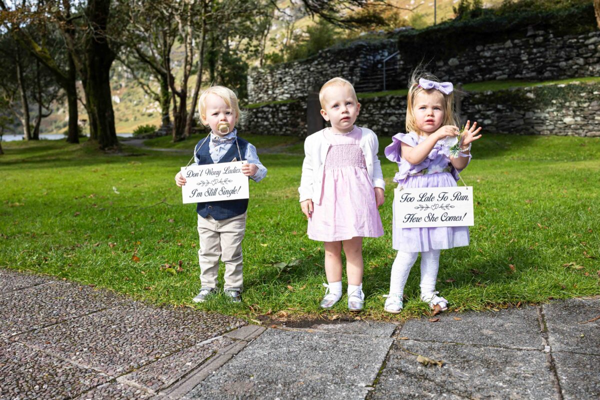 Guests smiling during wedding ceremony — JOD Photography