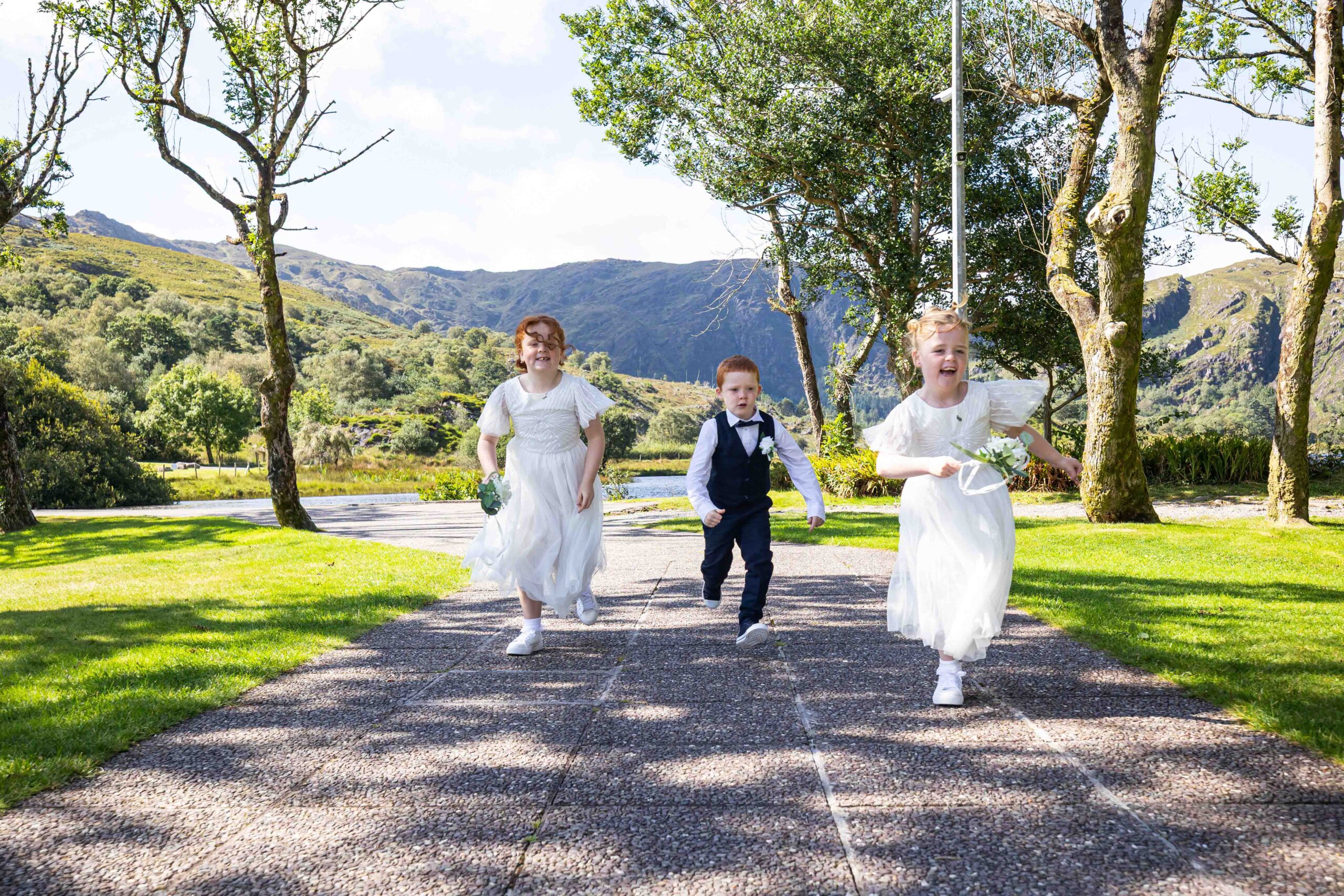 Candid moment of laughter outside Gougane Barra Oratory – JOD Photography