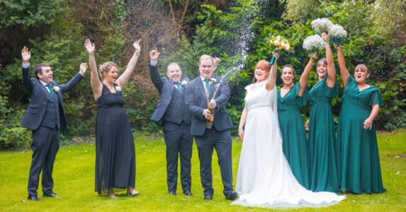 Small family wedding group outside Ballyseede Castle in Tralee — JOD Photography