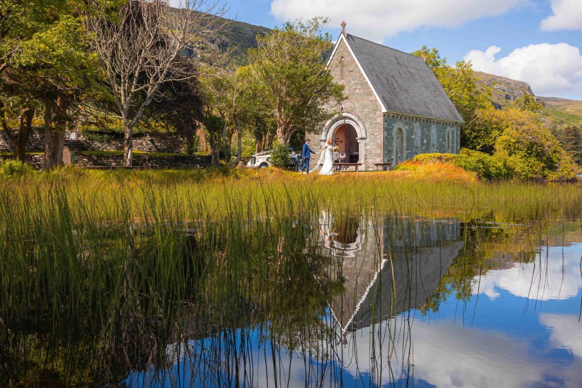 Natural wedding portrait of couple laughing outdoors at gougane barra – JOD Photography
