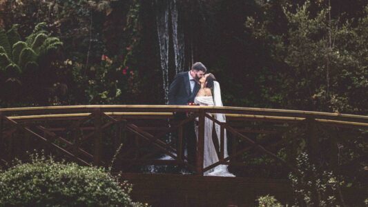 Bride adjusting veil at Charles Fort Kinsale — Cork wedding photographer — JOD Photography