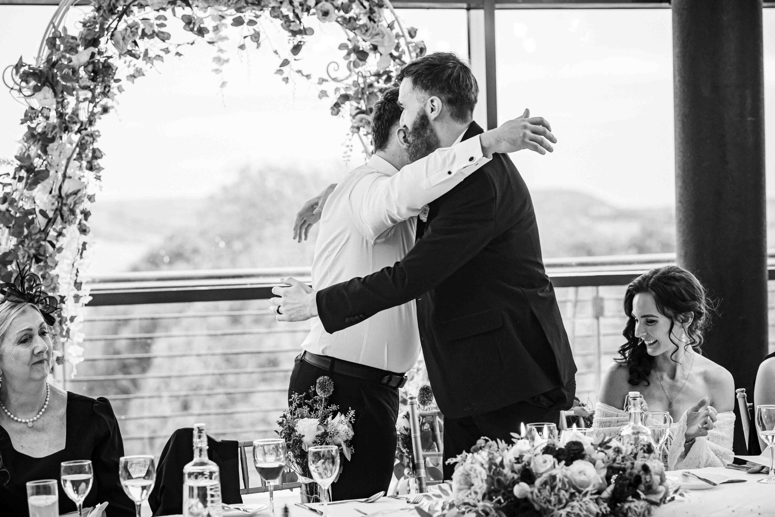 Candid moment between bride and bridesmaid — Kinsale wedding photography — JOD Photography