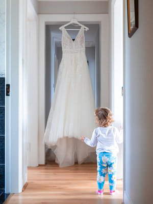 Bride and groom walking towards Gougane Barra chapel — JOD Photography