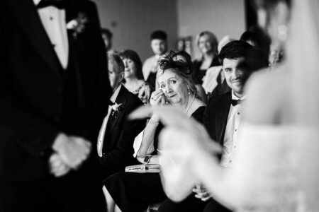 Guests laughing during wedding in Cork photographed by JOD Photography