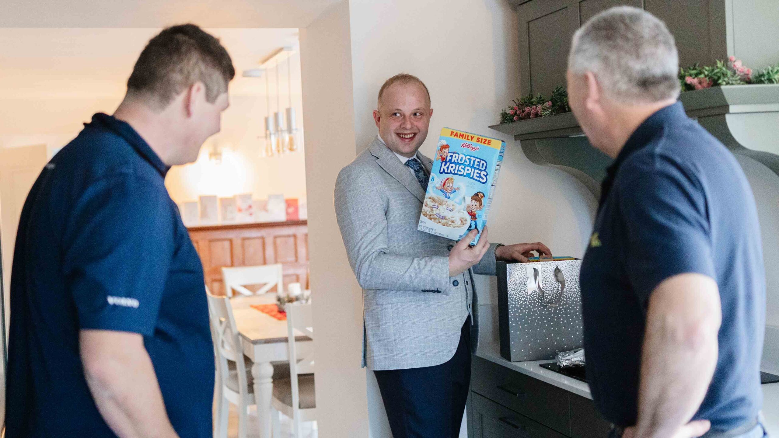 Shane opening a cereal box prank from the bridal party — JOD Photography