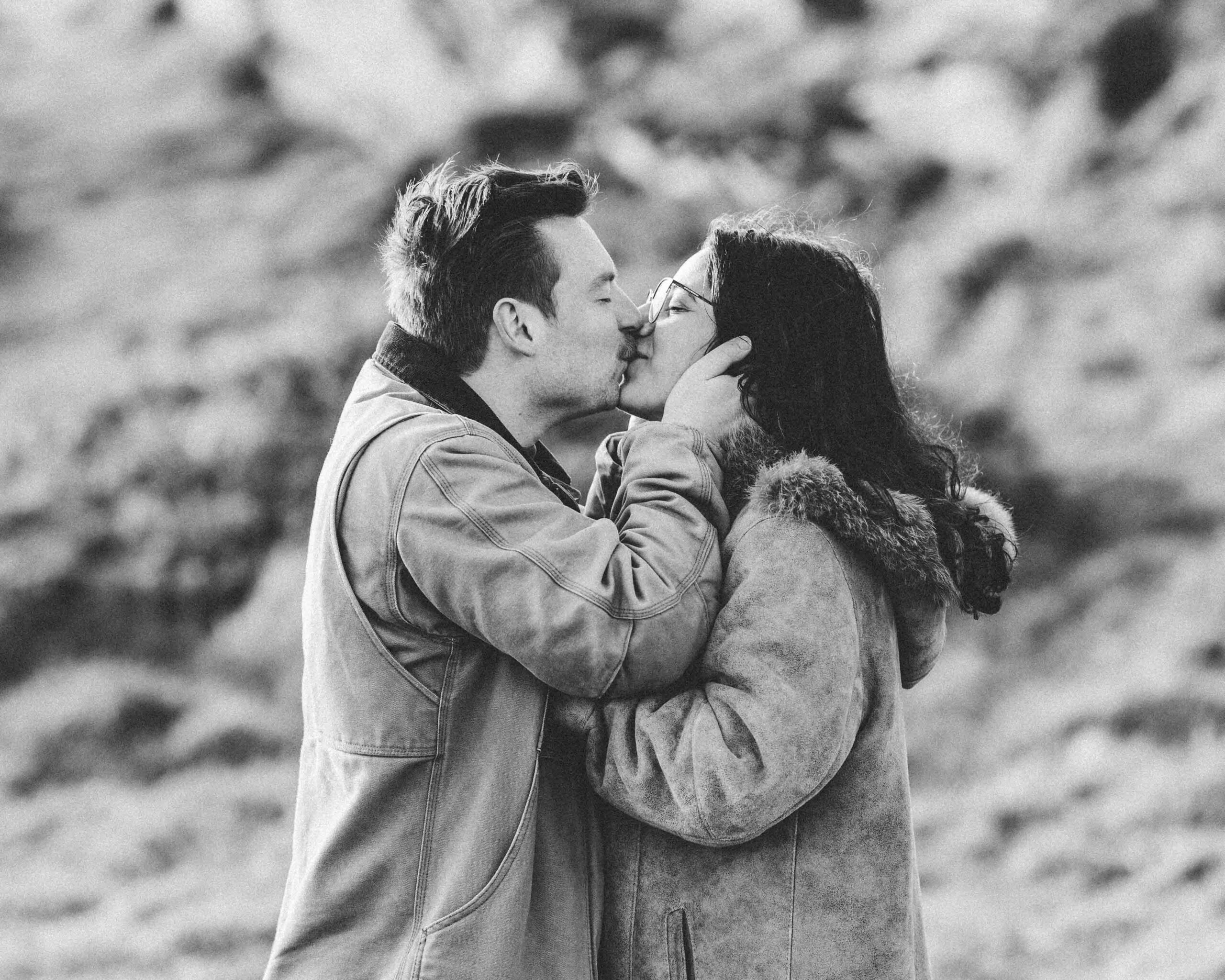 Natural candid engagement photo at Baltimore Beacon overlooking the Atlantic Ocean