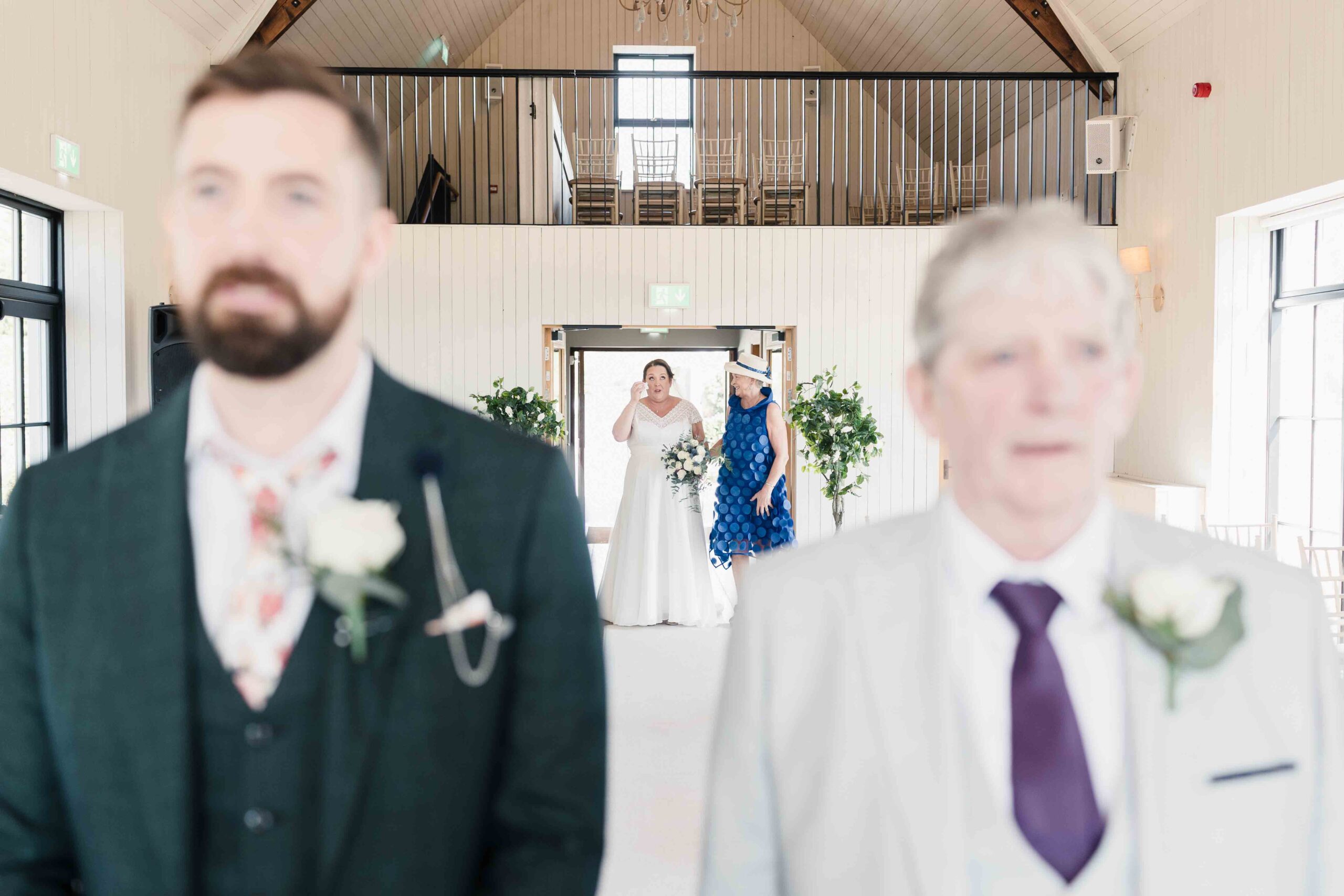 candid wedding moment bride laughing with bridesmaids morning prep – JOD Photography