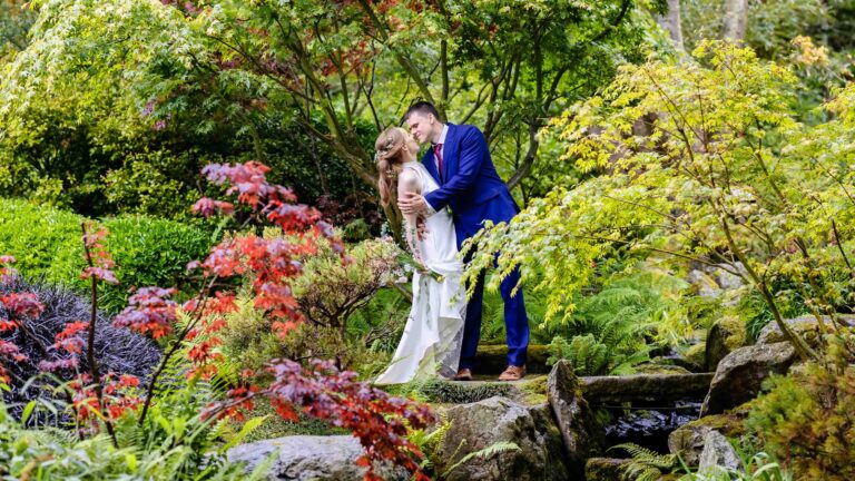 Couple portraits beside bridges and streams in Tramore