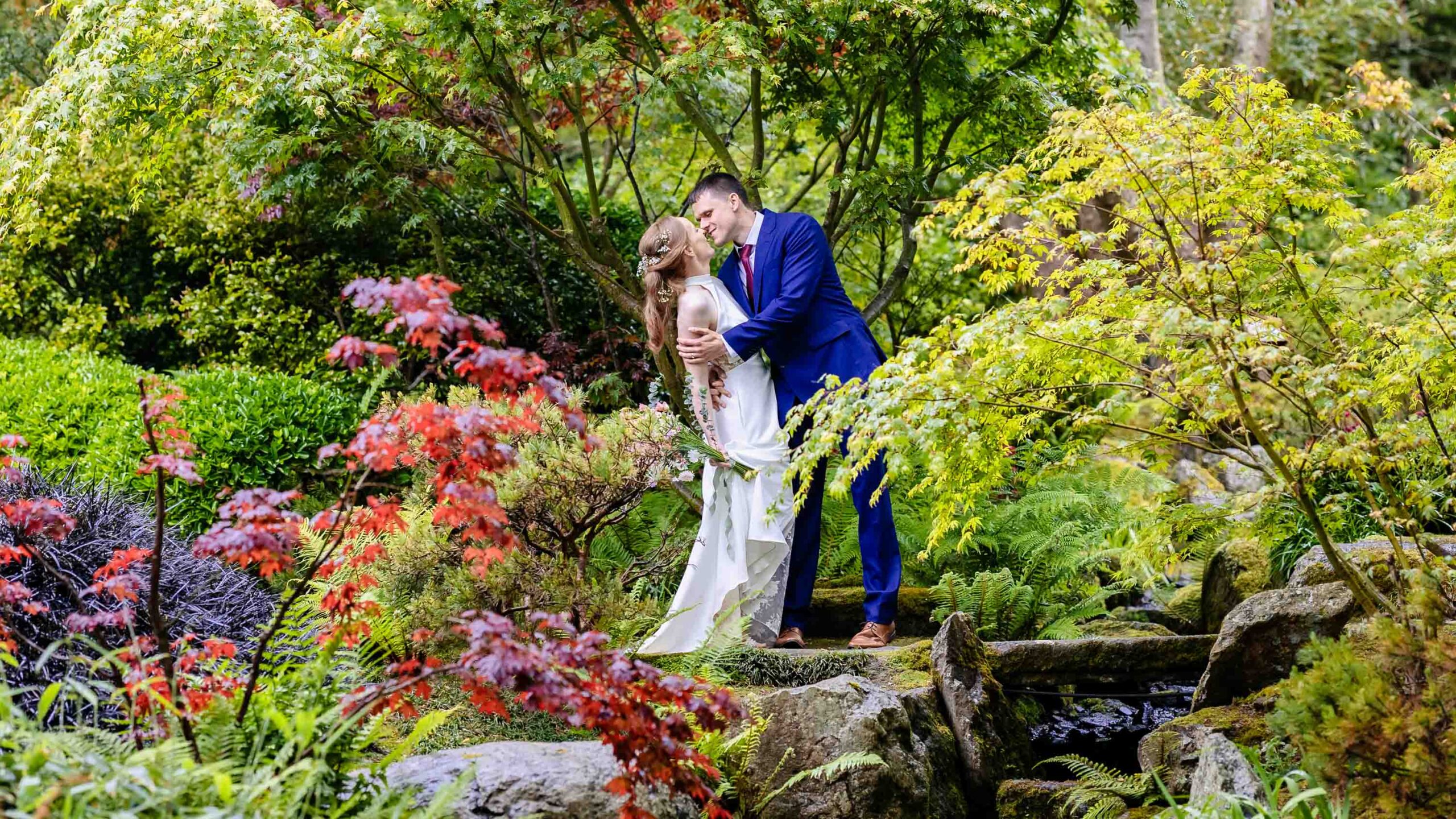 Couple portraits beside bridges and streams in Tramore