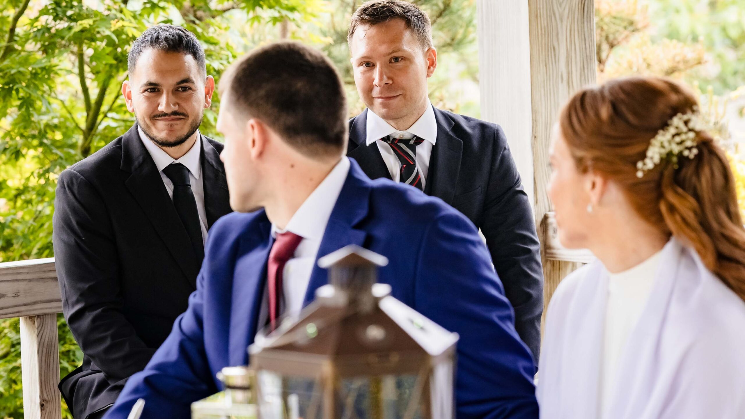 Groom smiling during intimate Irish wedding ceremony