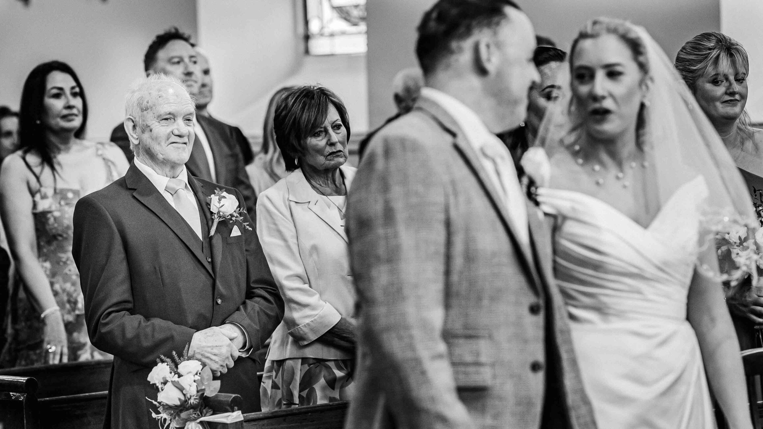 Couple embracing outdoors during wedding portraits in Cork