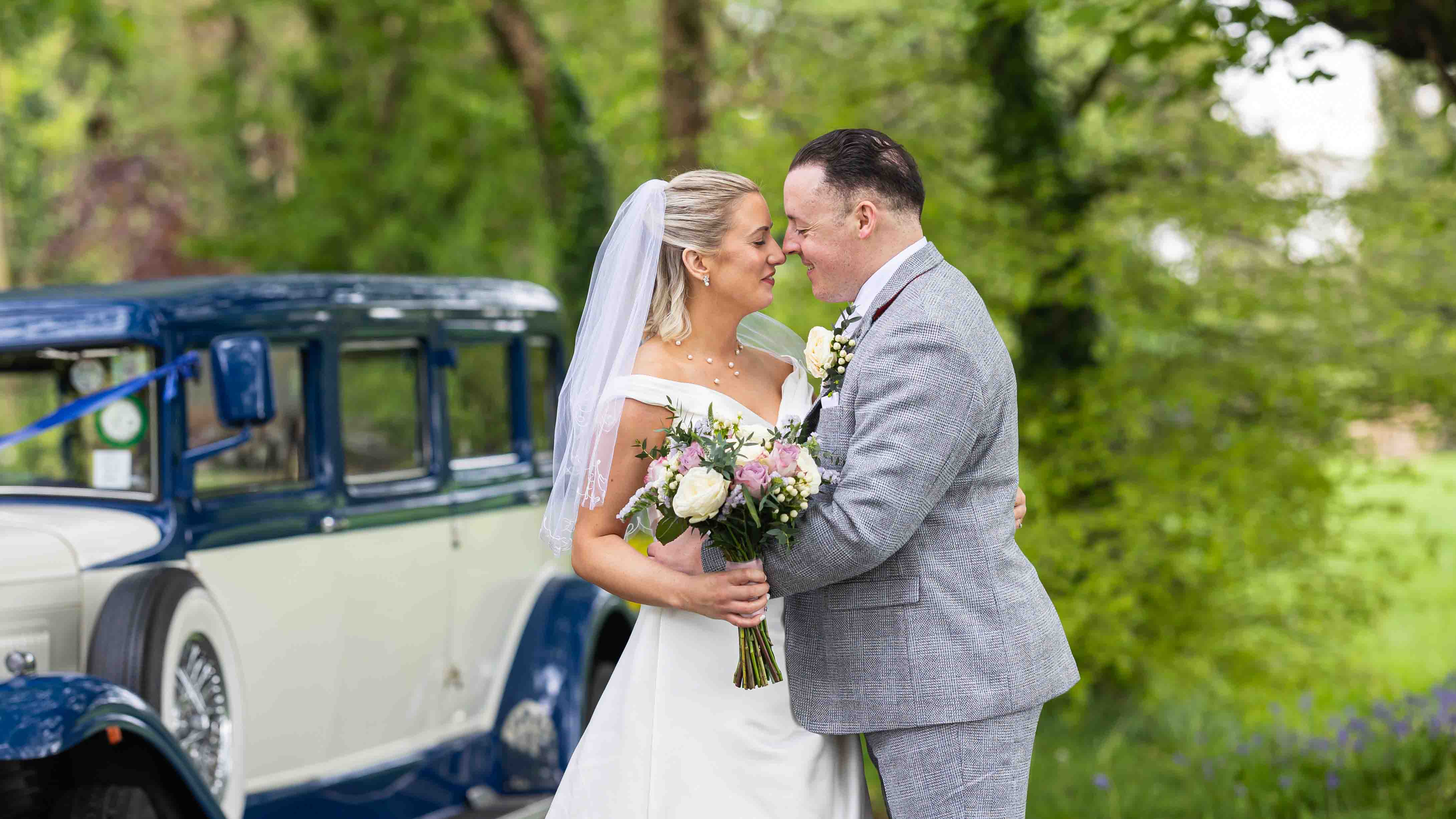 Bride and groom photographed naturally beside the river in Cork