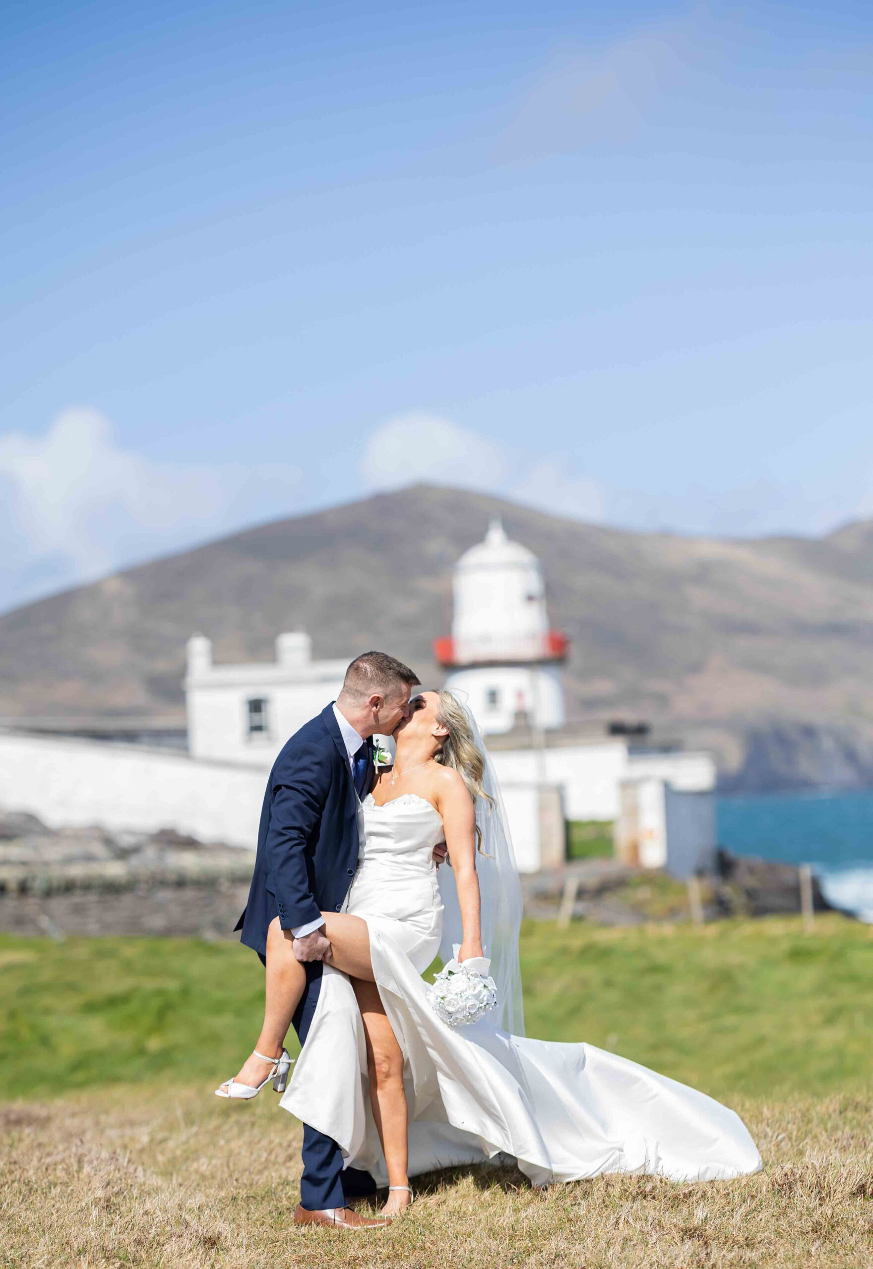 bride standing by window natural light valentia island wedding – JOD Photography