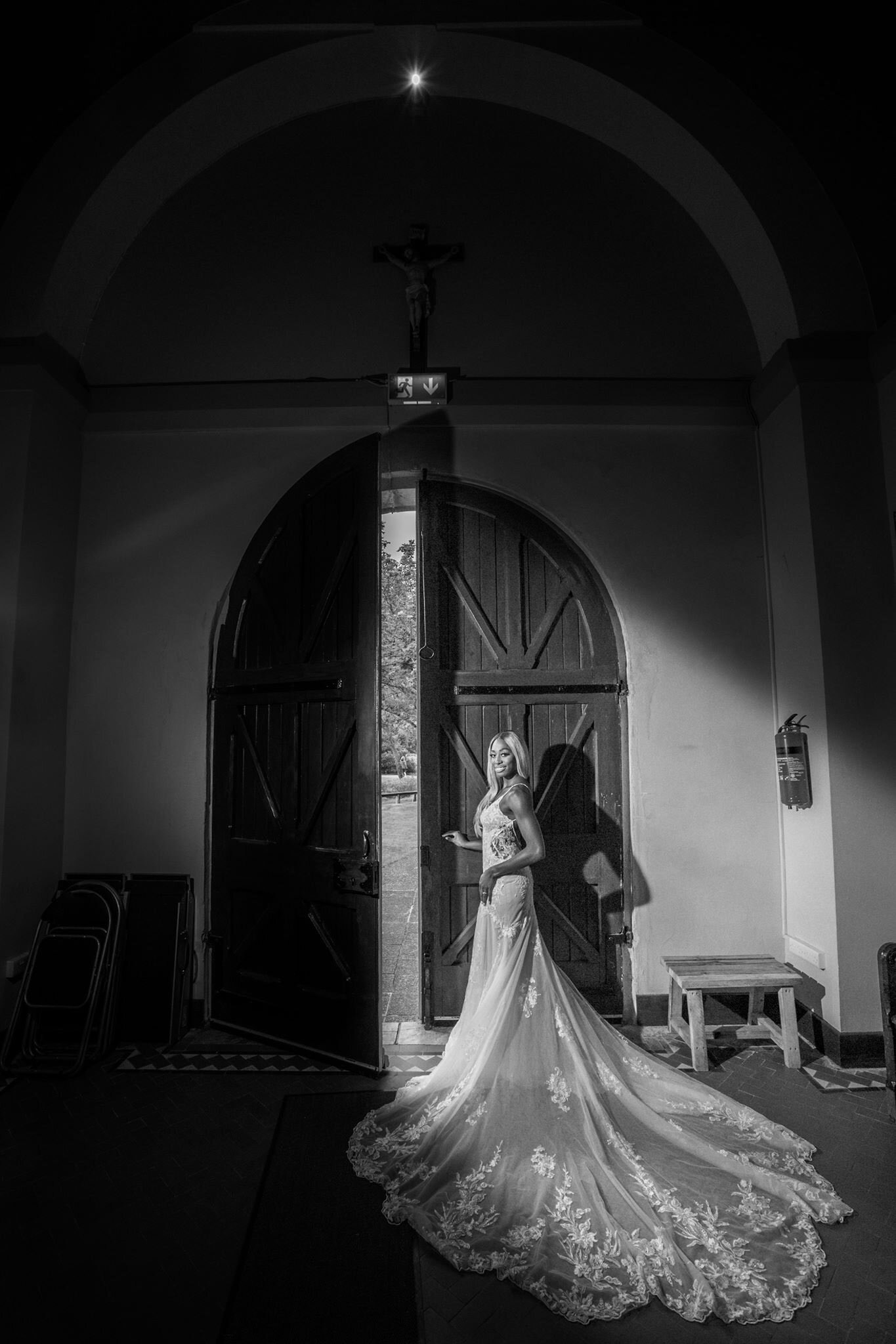 Elegant black and white bridal portrait inside Gougane Barra church captured by JOD Photography Cork wedding photographer