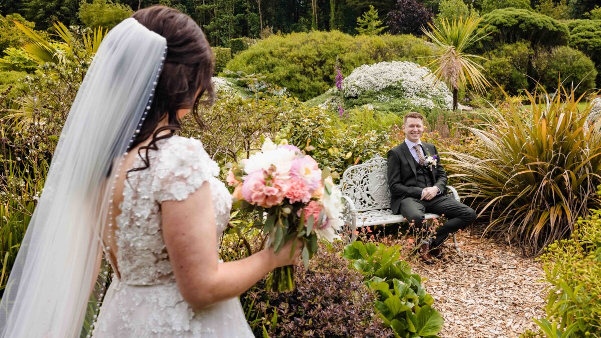 Groom seeing his bride for the first time at Vandeleur Gardens